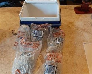 Small cooler with 5 bags of T post clips