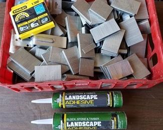 large lot of Staples and 2 tubes of Landscape adhesive