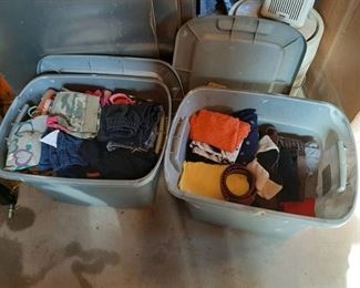 2 tubs with lids and contents - clothes