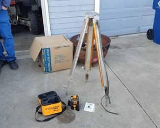 Laser level with tripod
