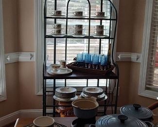 Lovely Iron Bakers Rack with Lenox Blue Stemmed Water Glasses. Le Cruset  in Carolina Blue. Mikasa Garden Harvest