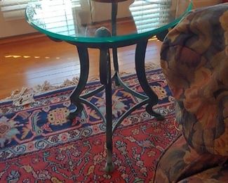 Elegant Glass and Iron Horsehoof Table.