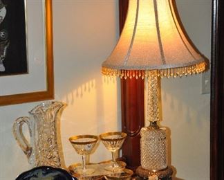 More Tiffin stemware, heavy crystal Table lamp, brilliant cut glass pitcher shown with Asian design Royal Crown porcelain dishes