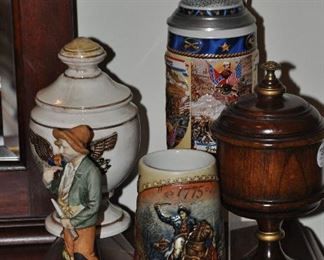 Miller Stein, "Birth of a Nation", shown with a Historical War series Stein, Civil War, an antique porcelain American eagle jar and a antique Meissen figurine (#1417)