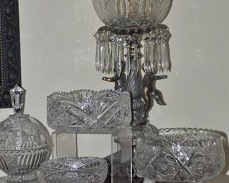Several pieces of cut crystal and cut glass shown with a Victorian cut crystal globe bronze and brass Parlor table lamp with crystal drops