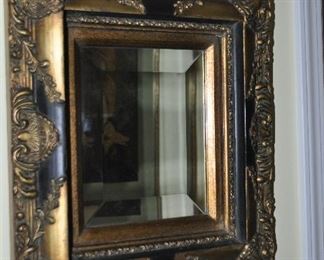 Chunky black and gold beveled mirror, 15" x 17"