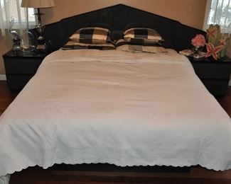Queen size Beautyrest Premier Luxury mattress shown on a black and grey lacquer platform bed with headboard and two attached 2 drawer nightstands from Bedland in Bloomfield Hills