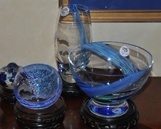 A selection of blue and clear glass dolphin Lenox pieces