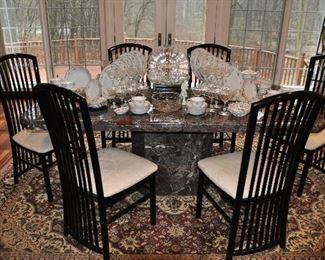 Marble pedestal dining table with 6 black lacquer upholstered dining chairs.  78.5"w x 39"d x 29"h