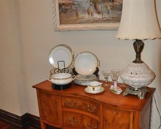 Great serving area in the dining room shown with a framed oil on canvas signed Burney (41" x 28.5").