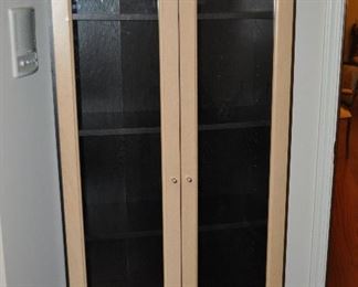 Matching closed bookshelf with black laminate interior adjustable shelves, 30"w x 71"h x 13"d