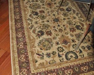 Beige, green and maroon floral nylon area rug by Oriental Weavers of America, 5'5" x 7'5"