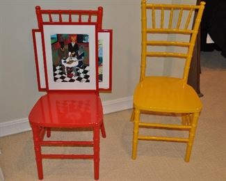 Whimsical painted dining chairs shown with a sample of the contemporary art available!