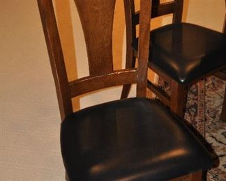 Set of four cherry and faux leather seat dining chairs, in excellent condition!