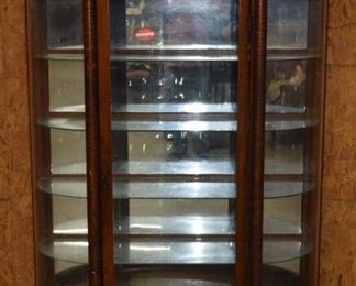 large carved oak wing griffin curved glass china cabinet 