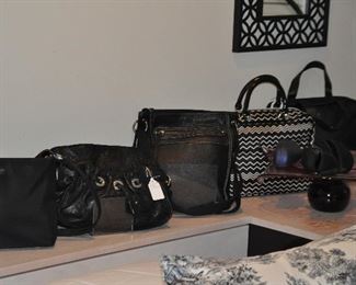 Several great black handbags including B. Makowsky, Kate Spade and The SAK.