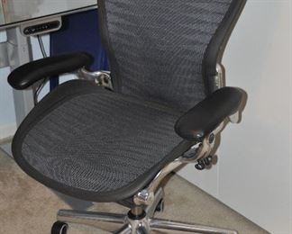 Herman Miller Aeron Chair made in the USA adjustable in carbon color C2, 42.75"H x 27"W.  