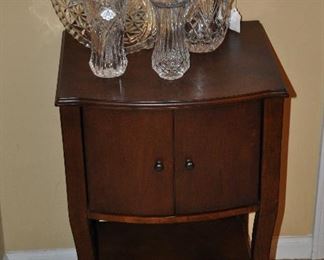 Petite side table with lower shelf and cabinet shown with additional cut crystal and glass