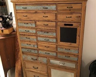 Neat wooden chest with many drawers for organizing