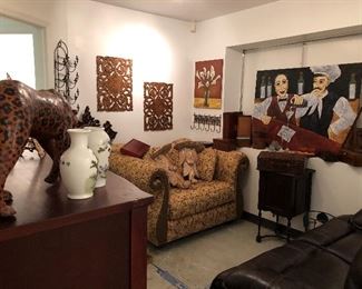 Beautiful oversized chair. So comfy! Lots of wooden items and original art!