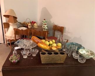 Two antique drop leaf tables. One is colonial and dates back to the mid 1800’s from the family estate. The other is a large, solid mahogany table that I used for projects in my studio. Would be gorgeouse restored. Four Mid Century wooden chairs. Very sturdy 1850’s with original fabric on the seats! A favorite!