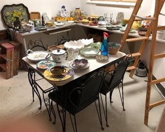 Very interesting and beautiful, heavy wrought iron table and chairs. Will need some TLC but worth it.