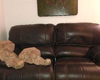 High quality, top grade leather, wall hugger, recliner loveseat in espresso brown. Once you sit in it, you won’t want to leave!