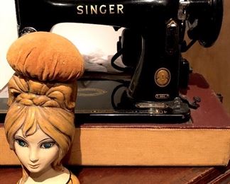 Vintage Singer sewing machine in very nice condition. Great for collectors. I really love the 1950’s lady head pin cushion!