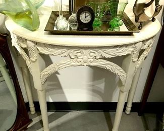 Nicely detailed white wooden half round table. Great accent piece!