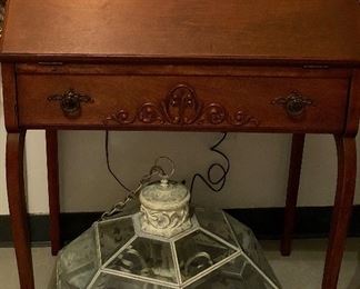 Beautiful vintage desk with a fold down writing platform, long drawer and interior wooden organizer. Very attractive functional piece for a relatively small space!