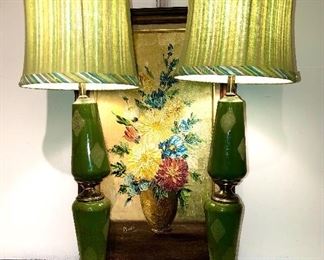 Cool retro 1950’s pair of ceramic and brass lamps. Great green color with a random diamond pattern in a lighter shade of green. The shades are new (not original) but look terrific on this awesome pair!