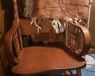 animal hide blanket, rocking chair
