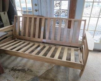 Wonderful settee that will fold out as a bed