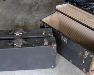 These two cases fit inside the trunk for ease of Travel, antique pieces