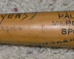 close up of autographed American legion small Bat