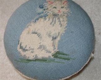 Very tiny footstool with cat needlepoint