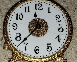 Porcelain face antique clock