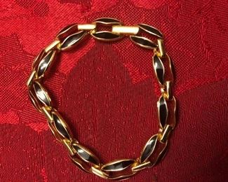 Metal and enamel bracelet