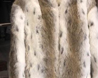 Reversible faux fur hooded jacket