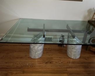 Beveled glass table, no nicks or scratches 5'8"x3'6 "
Two marble stands "all marble" hold this beauty. With 4 beautiful undamaged white leather chairs.