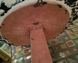 (back of) Stand-up Oval mirror from New Orleans.