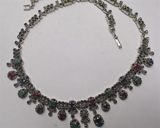 STERLING SILVER NECKLACE WITH RUBIES, SAPPHIRES, AND EMERALDS INCLUDING THREE CENTER "DROPS