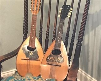 ornate mahogany antique rocker and mandolins
