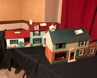 Two metal tin dollhouses, completely furnished. Original vintage furniture.