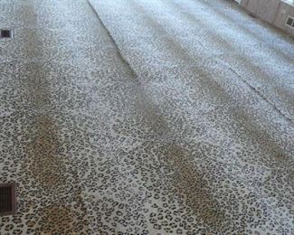 Leopard Carpet 24' X 16' $150.00