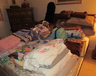 clean linens, comforters, blankets, quilts, afghans, towels