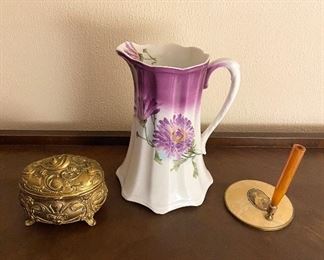 Dresser trinket box, E.L.P. Co. antique pitcher, and a celluloid pen holder with mirror.