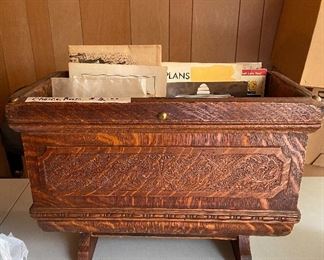 Magazine rack made from oak sewing machine cover.