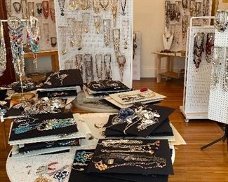 This is one of over a dozen large areas covered with jewelry and accessories, as well as all the fixings to make and manufacture jewelry.