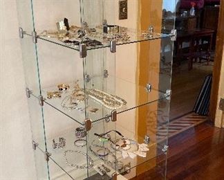 There are cases, racks and hundreds of jewelry accessories also